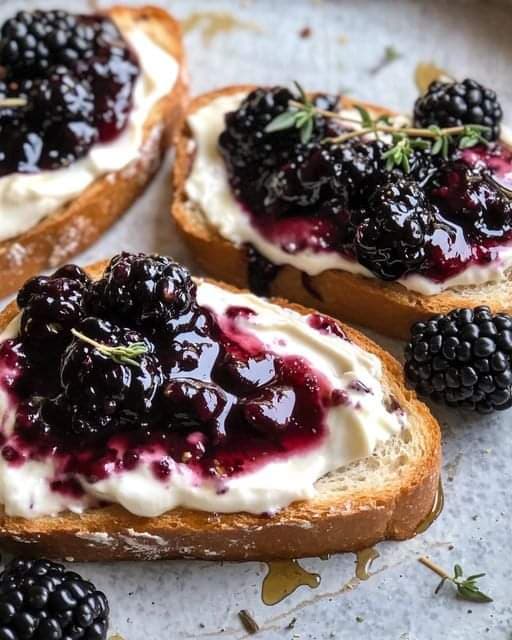 Blackberry ricotta crostini